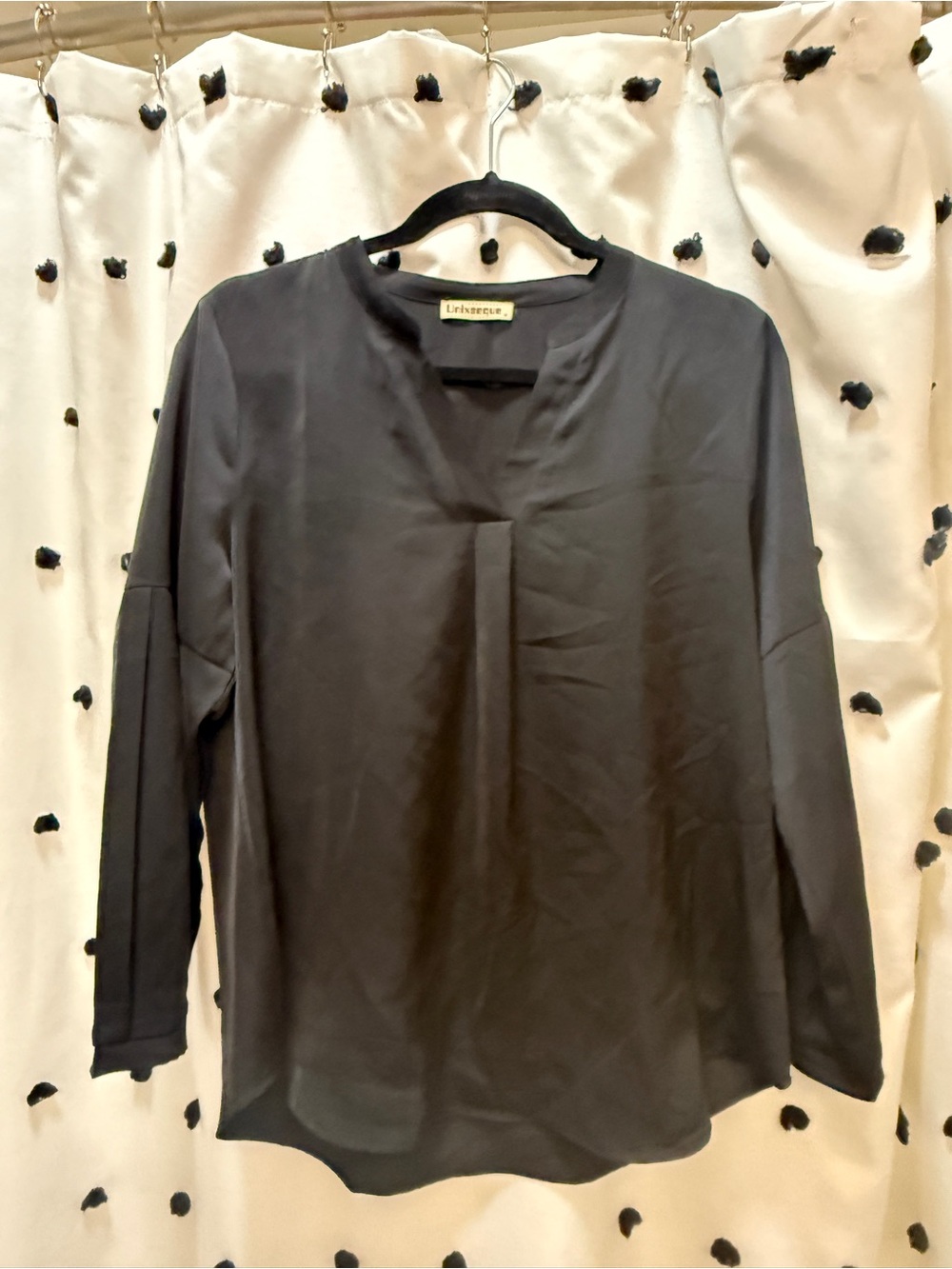 Black Long-Sleeve V-Neck Top with Front Pleat